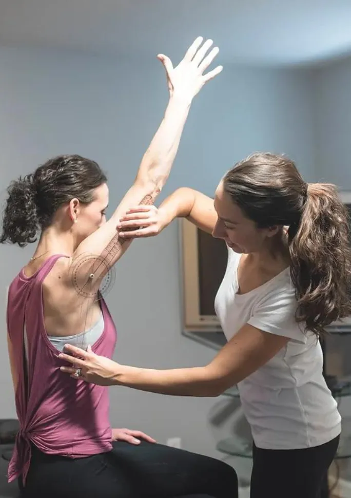 Physical therapist working one on one with a patient at our Epping, NH clinic