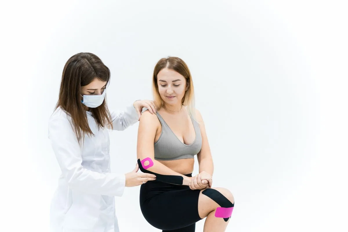 Therapist assessing a patient for orthopedic pain